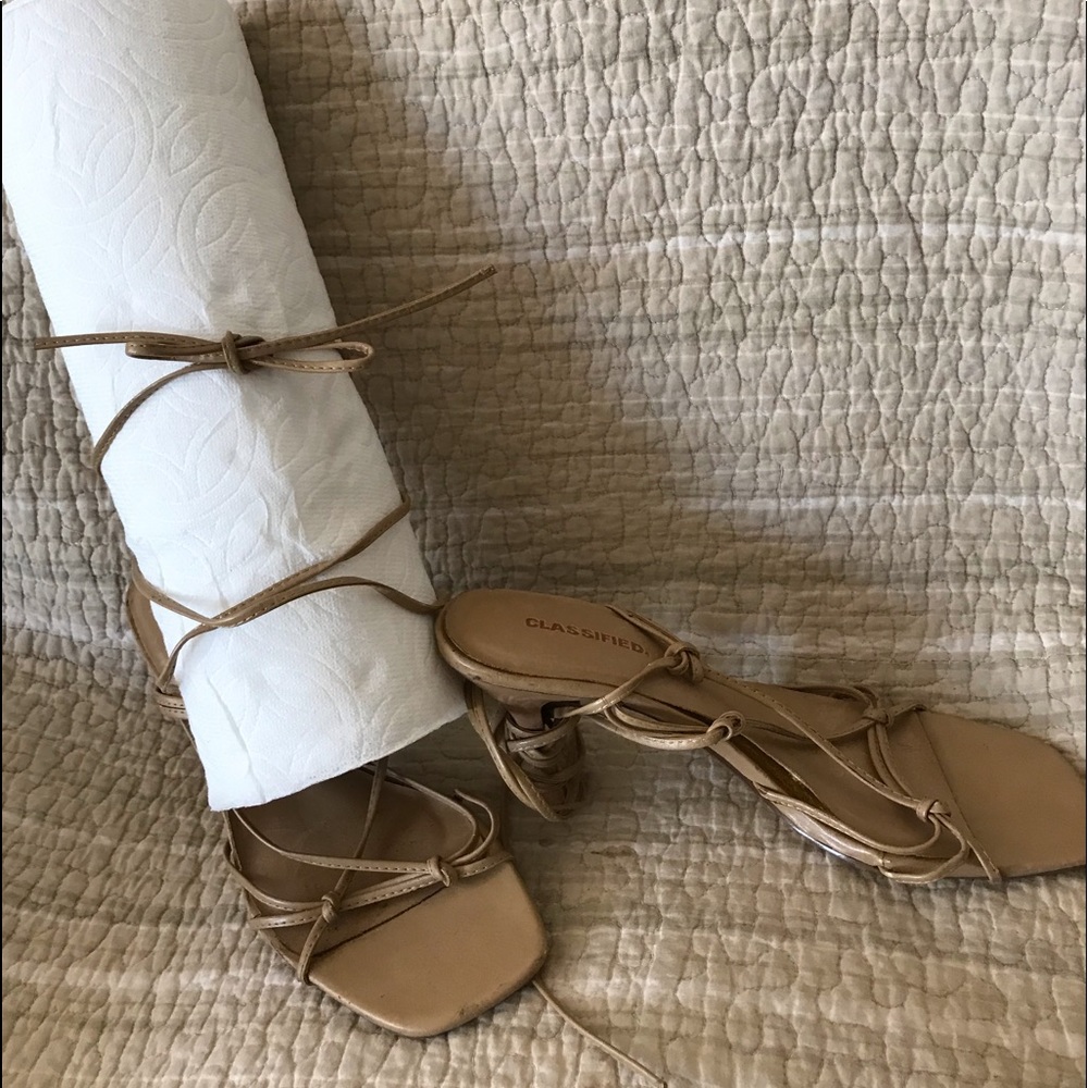 Tan strappy 4” heels.